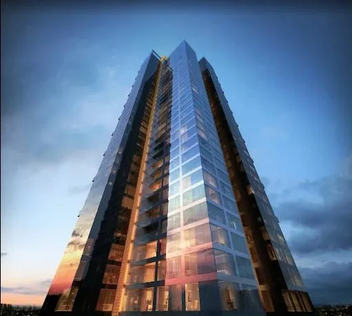 Trump Tower Kolkata glass façade rising into the evening sky